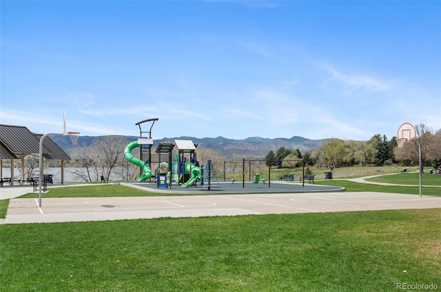 2032 W Nantucket Ct, Littleton, CO 80120 - communal playground featuring a lawn, a mountain view, and community basketball court