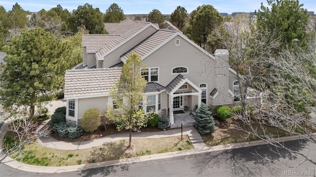 2032 W Nantucket Ct, Littleton, CO 80120 - view of front of home with a chimney