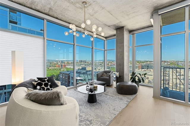 1700 Bassett St Unit 1014, Denver, CO 80202 - sunroom with a city view and a chandelier