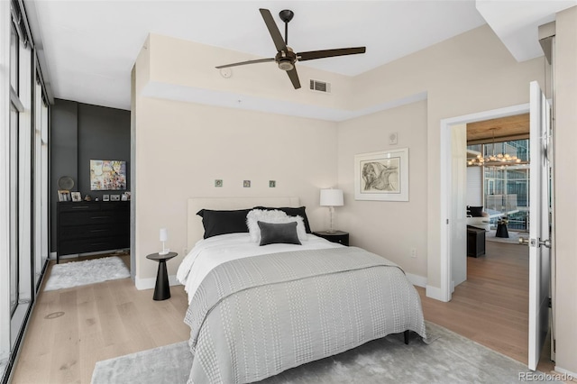 1700 Bassett St Unit 1014, Denver, CO 80202 - bedroom featuring light wood-style flooring and ceiling fan