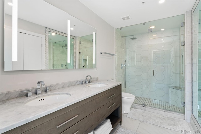 1700 Bassett St Unit 1014, Denver, CO 80202 - full bathroom featuring a stall shower, double vanity, tile patterned floors, and recessed lighting