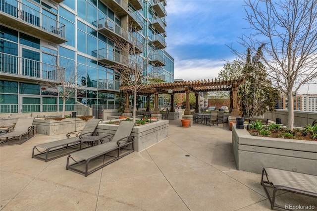 1700 Bassett St Unit 1014, Denver, CO 80202 - surrounding community featuring a pergola and a patio area
