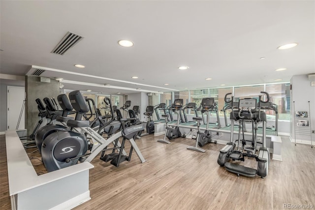 1700 Bassett St Unit 1014, Denver, CO 80202 - gym featuring wood finished floors and recessed lighting