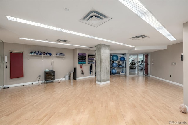 1700 Bassett St Unit 1014, Denver, CO 80202 - exercise area with wood finished floors and baseboards