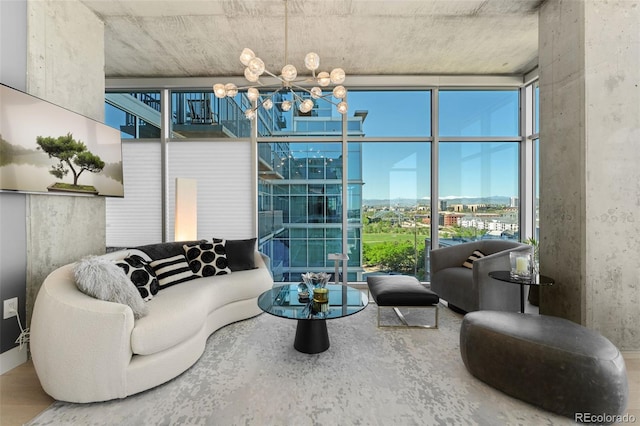 1700 Bassett St Unit 1014, Denver, CO 80202 - living area with plenty of natural light, expansive windows, a city view, and a chandelier
