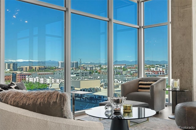1700 Bassett St Unit 1014, Denver, CO 80202 - living area featuring a city view, a mountain view, plenty of natural light, and expansive windows