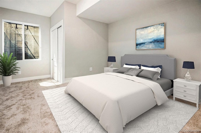 bedroom featuring a closet, baseboards, and carpet