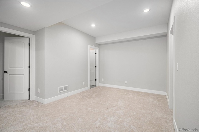 interior space with recessed lighting, carpet, visible vents, and baseboards