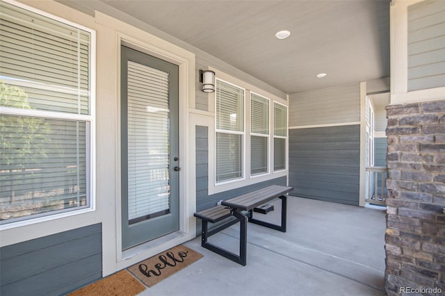 entrance to property with a porch