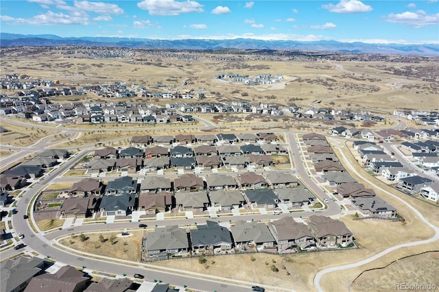 drone / aerial view featuring a mountain view and a residential view