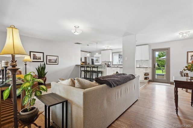 living room featuring light hardwood / wood-style flooring