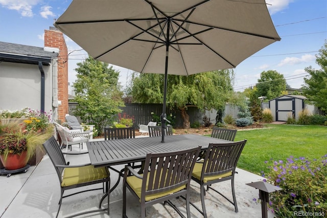 view of patio / terrace featuring a storage unit