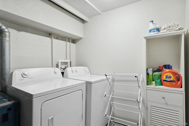 laundry area featuring washer and clothes dryer