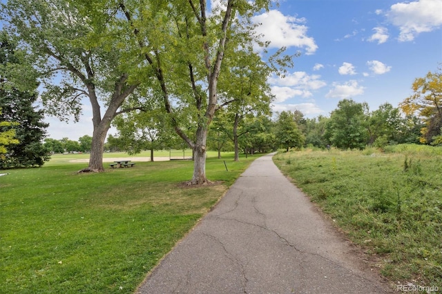 surrounding community featuring a lawn