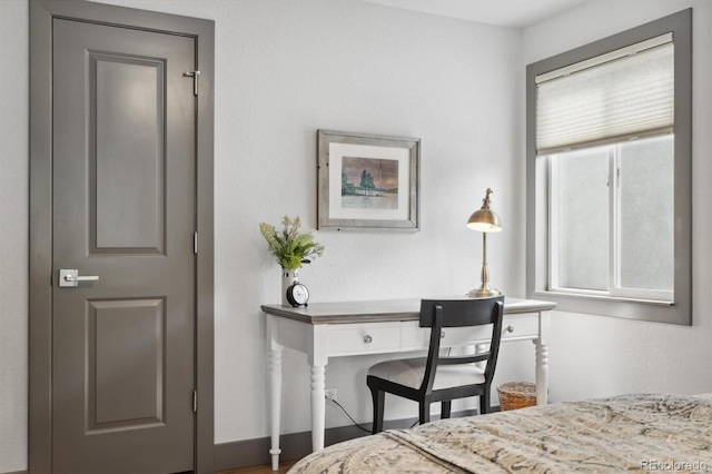 bedroom with multiple windows