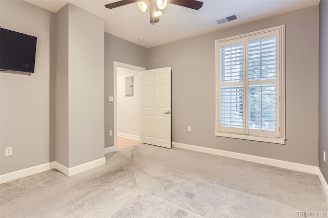 1630 N Clarkson St Unit 204, Denver, CO 80218 - unfurnished bedroom with light carpet, ceiling fan, and electric panel