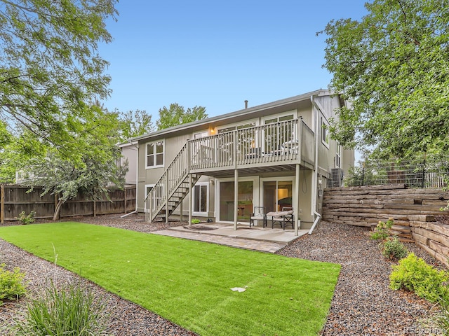 6378 S Emporia Cir, Englewood, CO 80111 - back of property with stairway, a patio, and a deck