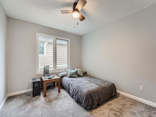 19098 E Ida Dr, Aurora, CO 80015 - bedroom with carpet, a textured ceiling, baseboards, and a ceiling fan