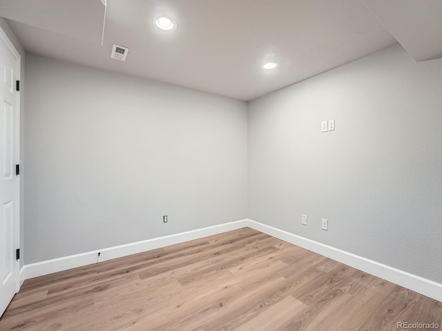 19098 E Ida Dr, Aurora, CO 80015 - spare room with light wood-type flooring, baseboards, and recessed lighting