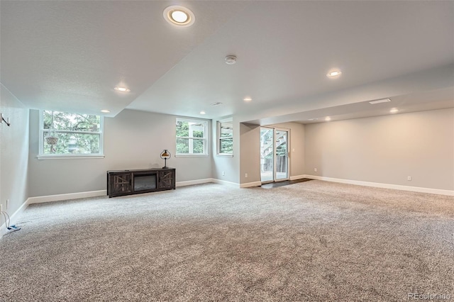 19098 E Ida Dr, Aurora, CO 80015 - unfurnished living room featuring carpet floors, baseboards, and recessed lighting