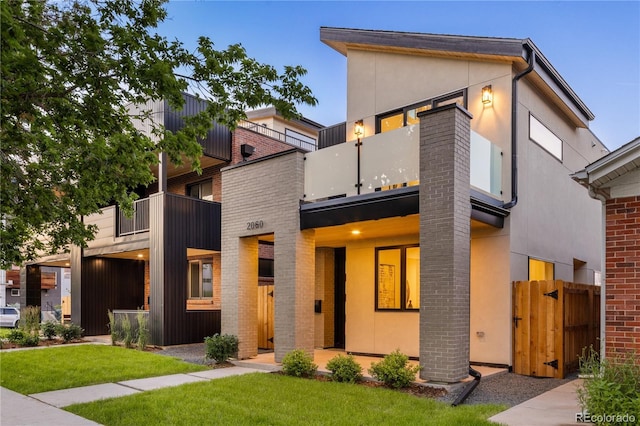 2060 Eliot St, Denver, CO 80211 - contemporary house with a balcony and stucco siding