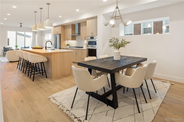 2060 Eliot St, Denver, CO 80211 - dining area featuring recessed lighting and light wood finished floors