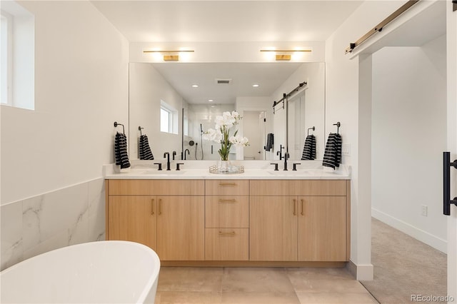 2060 Eliot St, Denver, CO 80211 - full bathroom featuring double vanity, a freestanding bath, and a stall shower