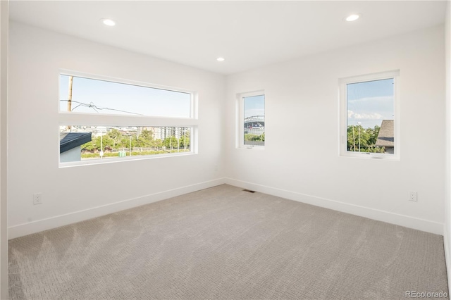 2060 Eliot St, Denver, CO 80211 - carpeted spare room featuring recessed lighting