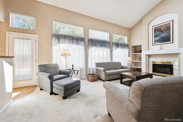 13362 Marion St, Thornton, CO 80241 - living area with high vaulted ceiling, carpet floors, and a fireplace