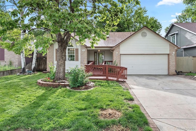 204 Maple St, Frederick, CO 80530 - single story home with an attached garage, brick siding, concrete driveway, and roof with shingles