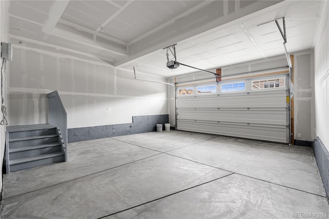 8863 Springsong Ln, Littleton, CO 80125 - garage featuring a garage door opener