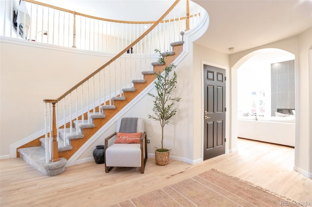 stairs with wood-type flooring