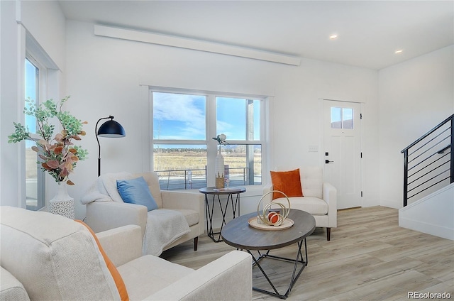 living room with light hardwood / wood-style floors