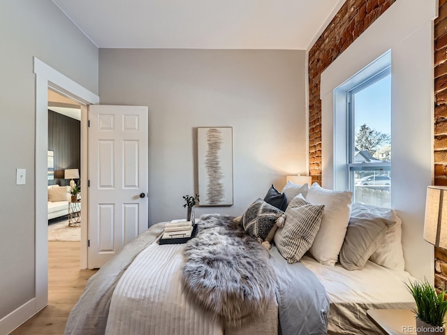 bedroom featuring wood finished floors