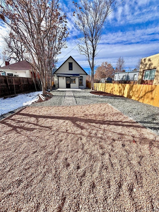 view of front of property with fence