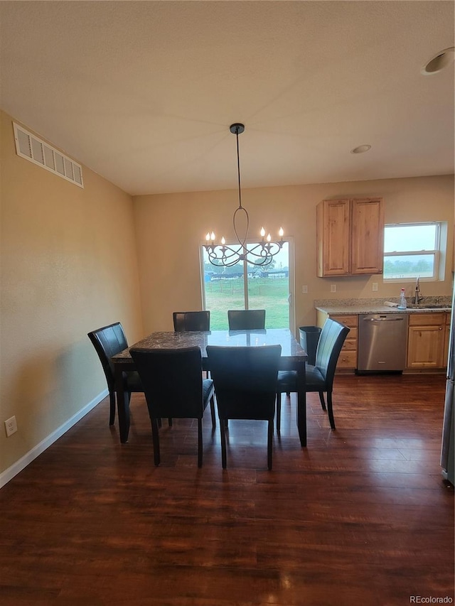 1431 4th Pl, Deer Trail, CO 80105 - dining room with a chandelier, dark wood-type flooring, baseboards, and recessed lighting