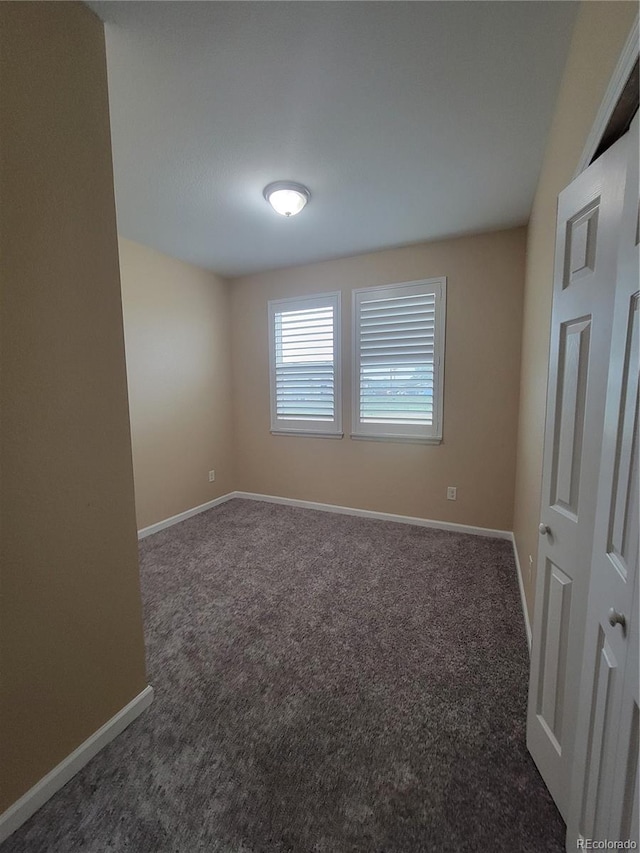 1431 4th Pl, Deer Trail, CO 80105 - carpeted empty room featuring baseboards