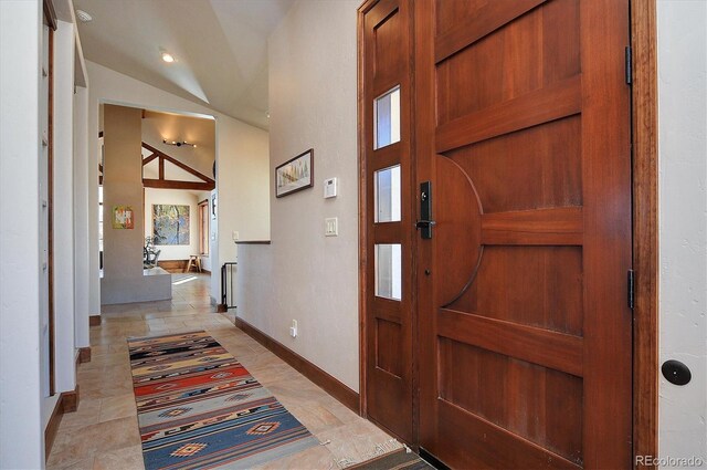 1100 Pinon Dr, Poncha Springs, CO 81242 - foyer featuring baseboards and vaulted ceiling
