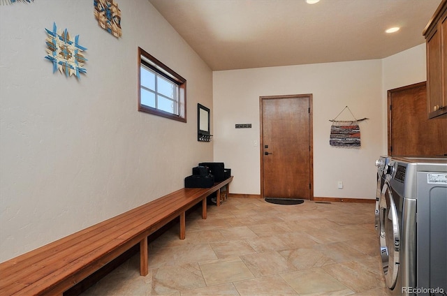 1100 Pinon Dr, Poncha Springs, CO 81242 - clothes washing area with stone finish floor, recessed lighting, baseboards, cabinet space, and washer and clothes dryer