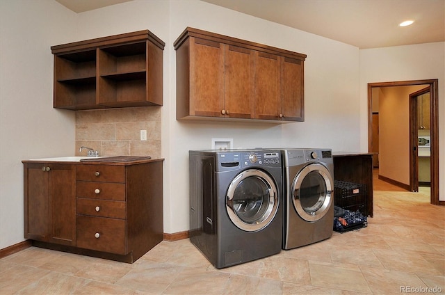 1100 Pinon Dr, Poncha Springs, CO 81242 - clothes washing area with washer and dryer, baseboards, and cabinet space
