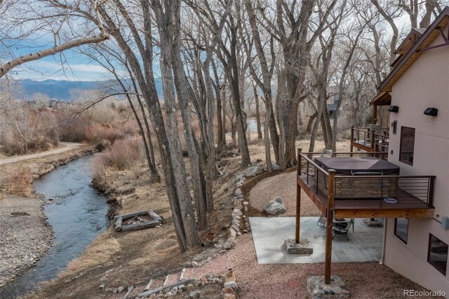 1100 Pinon Dr, Poncha Springs, CO 81242 - view of yard with a mountain view, a patio, and a hot tub