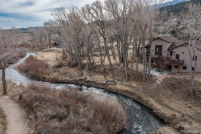 1100 Pinon Dr, Poncha Springs, CO 81242 - exterior space with a deck with mountain view and a patio