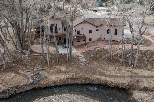 1100 Pinon Dr, Poncha Springs, CO 81242 - view of yard featuring central air condition unit, a patio, a deck, and stairs