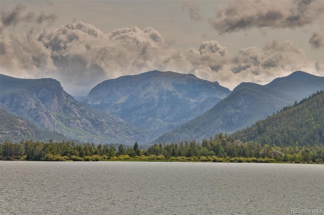 property view of mountains featuring a water view