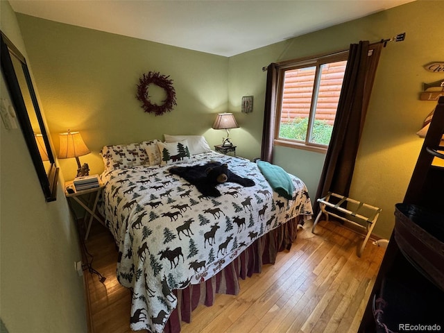 bedroom featuring light wood-type flooring