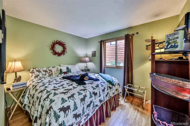 bedroom featuring hardwood / wood-style flooring