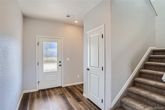 interior space with dark hardwood / wood-style flooring