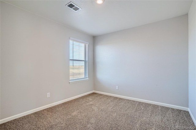 unfurnished room featuring carpet floors