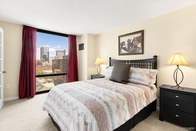 1625 Larimer St Unit 1605, Denver, CO 80202 - carpeted bedroom featuring floor to ceiling windows and a view of city