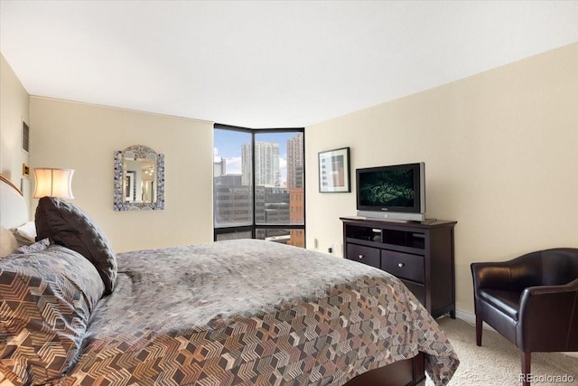 1625 Larimer St Unit 1605, Denver, CO 80202 - bedroom with carpet floors and a wall of windows
